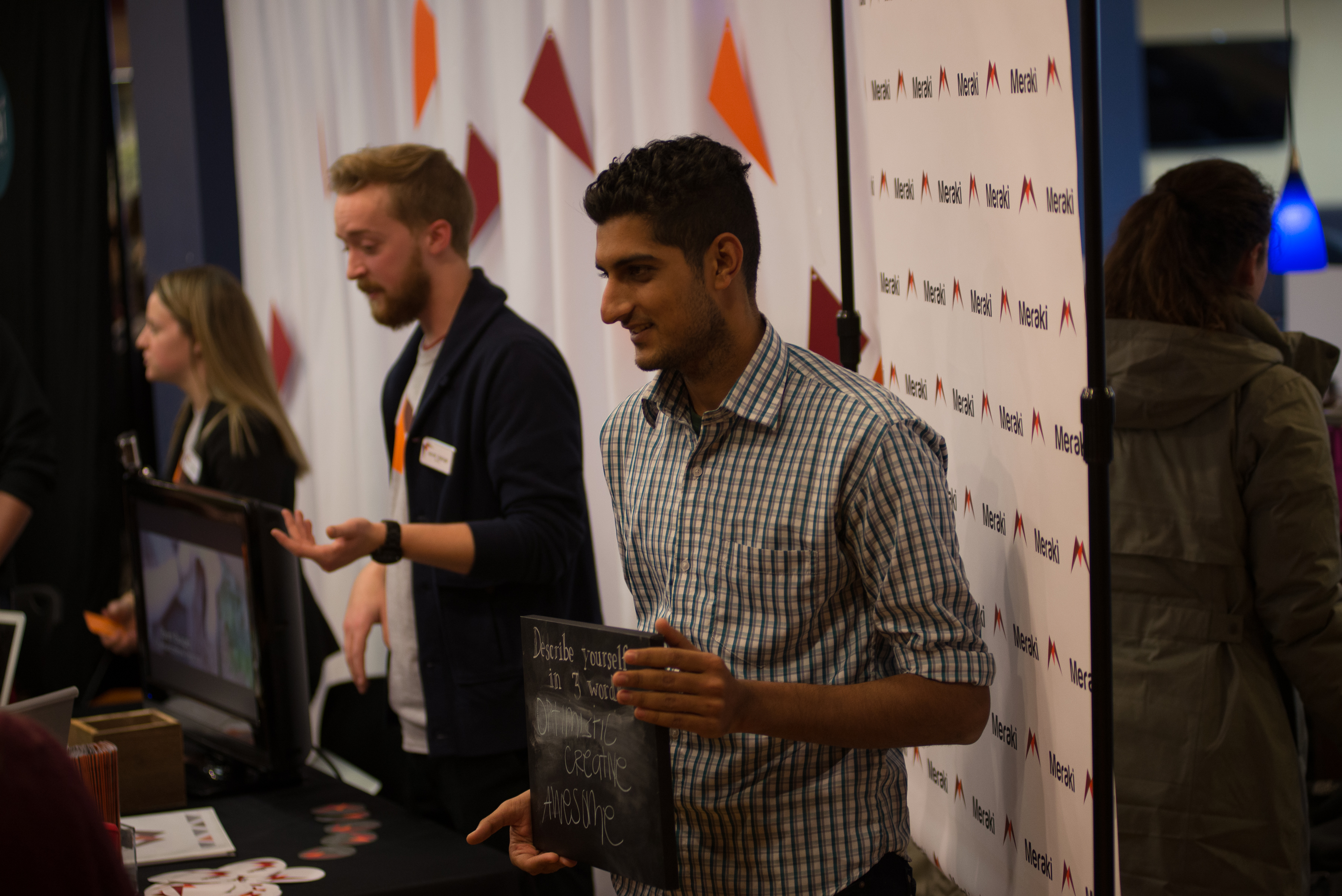 students presenting at trade show